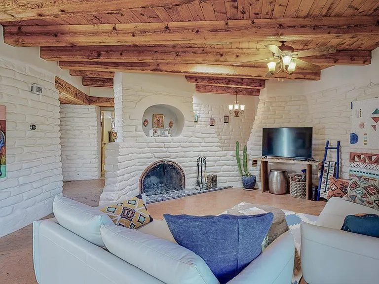 Living room and grand kiva fireplace