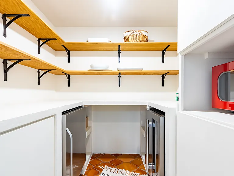 Pantry with mini fridge, wine fridge & microwave