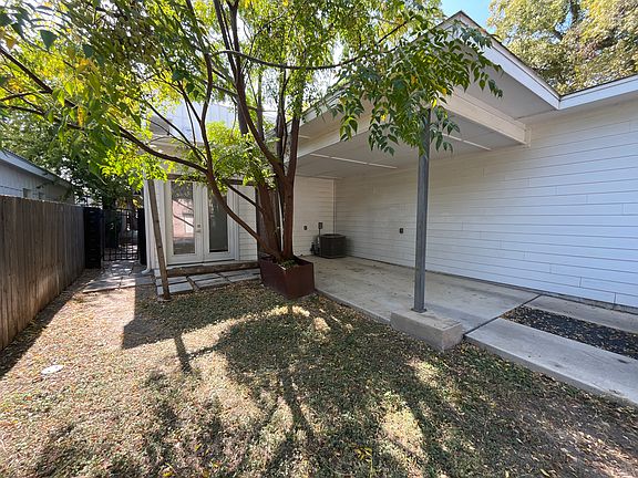 Backyard area with carport and alley access