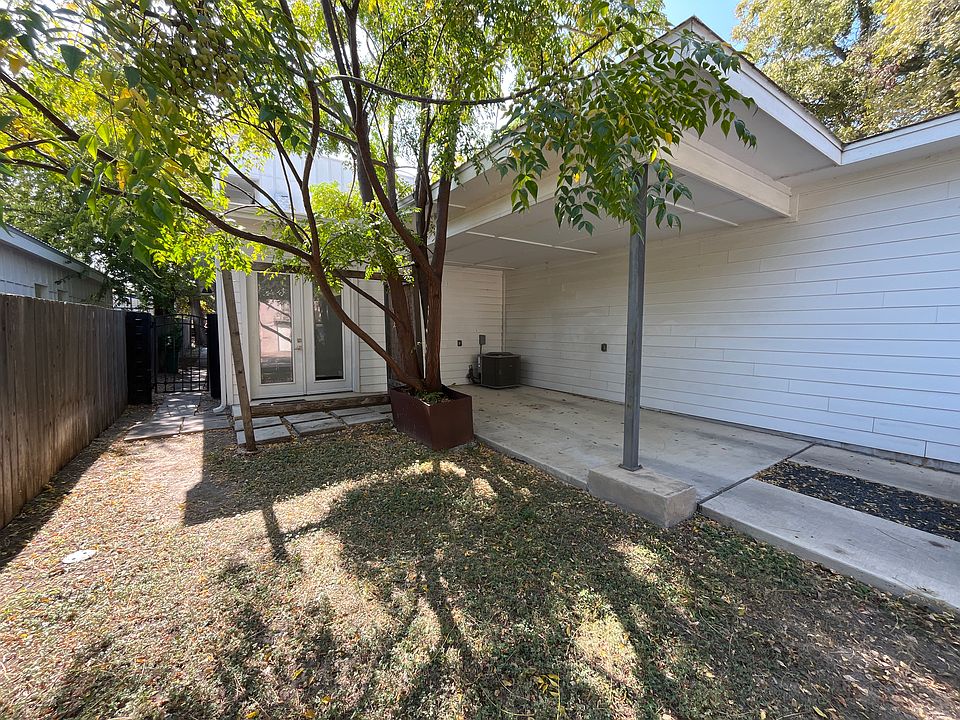 Backyard area with carport and alley access