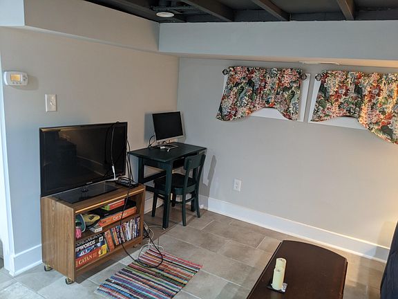 TV nook w/ space for a desk.