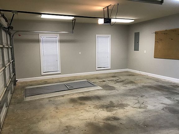 Attached garage with shelter