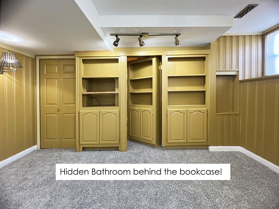 Secret hidden bathroom behind the bedroom bookcase!