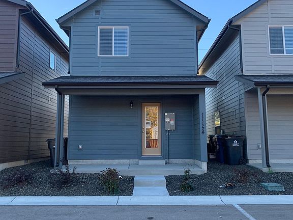 Back, parking space directly behind house