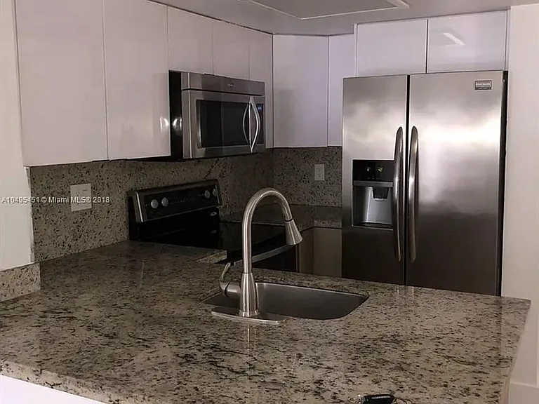 8670 NW 6th Ln #208 — Photo 3