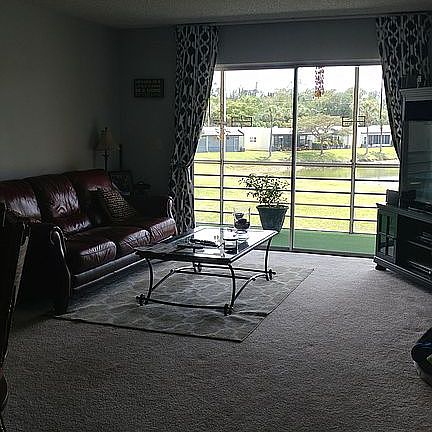 Plush neutral carpet on feet