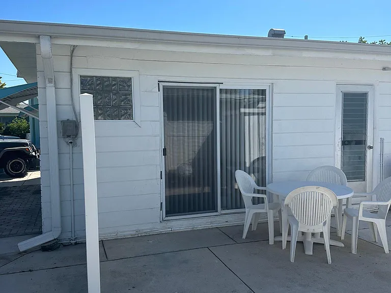 Small semi private patio, off the Livingroom sliding door