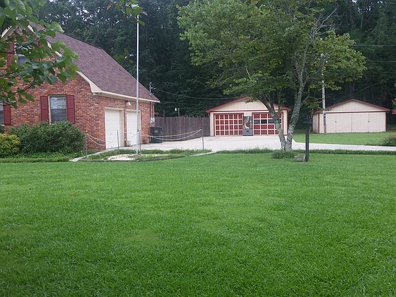 Two detached 2-car garages
