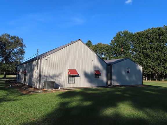Back side of home and detached garage