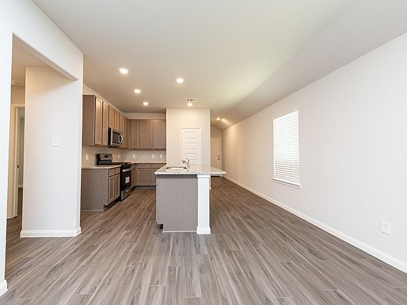 Family Room to Dining Area and Kitchen