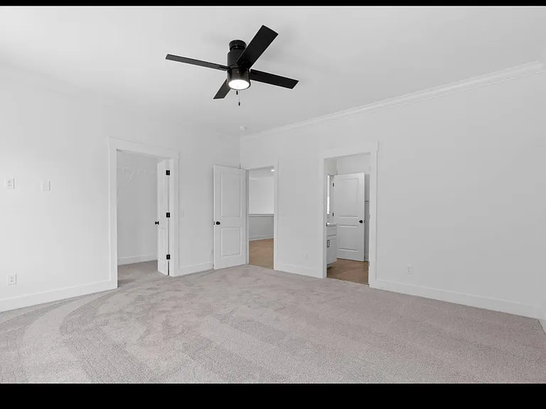 Spacious guest bedroom #1 with walk-in closet.