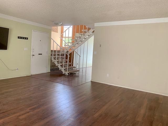 Living Room looking toward front door and Dining Area