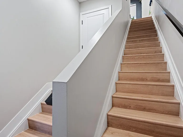 PSA: You will easily meet your step goals during your time at this townhome! There are a few from the garage (left), the longest set up to the main living area (right), one up to the bedrooms, and one more up to the rooftop! Stretch accordingly ;)