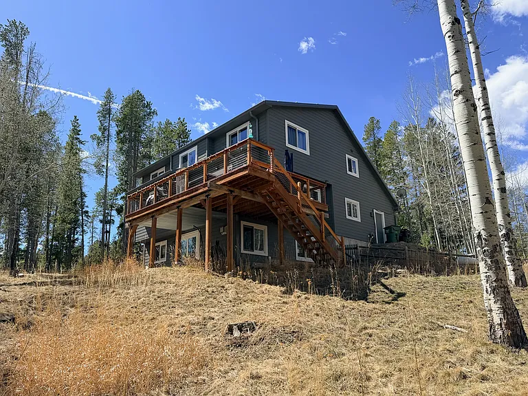 Outside view of home, large property all to yourself! WONDERFUL neighbors, west side facing of home buts up to 400+ acers of land (no neighbors on the west side!)