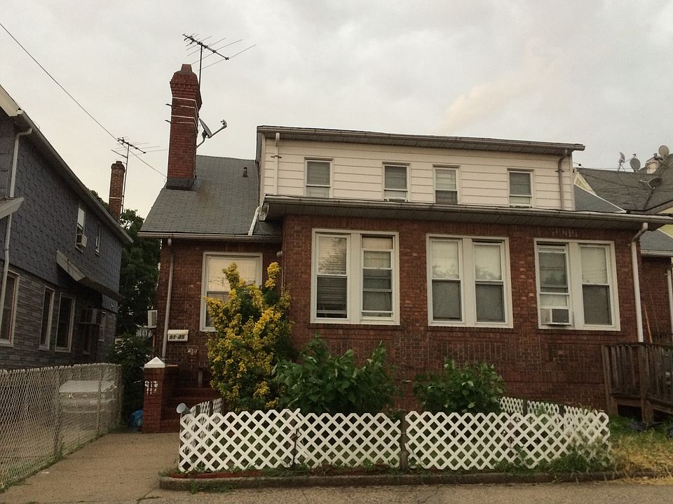 2nd image of 4 Family Brick House In Richmond Hill