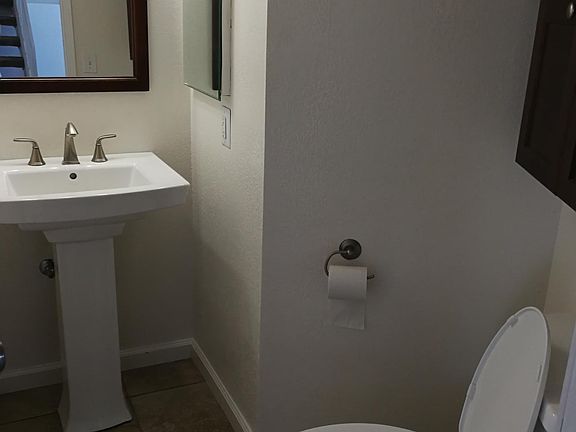 HALF BATH-(DOWNSTAIRS)