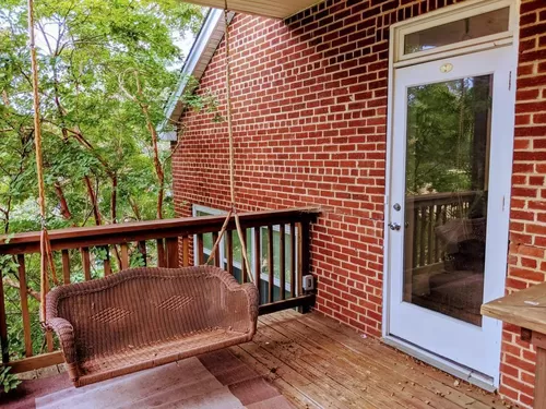 Front porch with porch swing - 900 N Ivy St #2