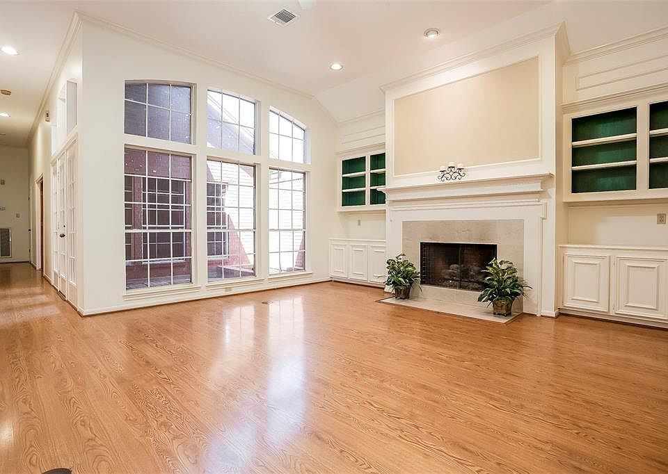 Beautiful wood laminate flooring through most of this home for easy care living. Lots of natural light from the private atrium.