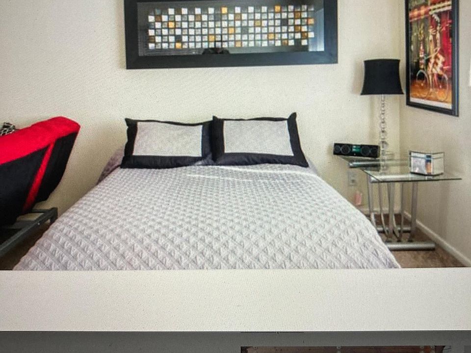 Full size bed with high quality bedding.