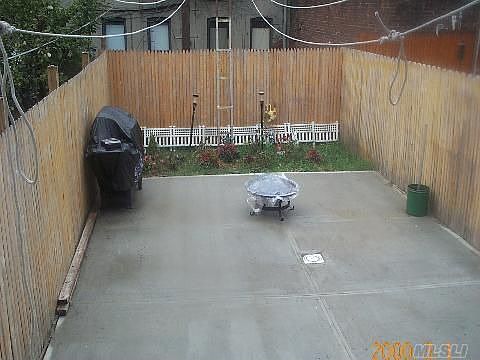 Backyard (new concrete and fences)