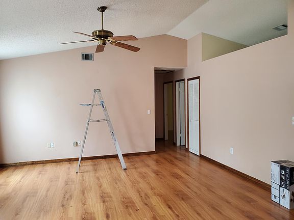 Living room - we're replacing the ceiling fan to add one with a light.