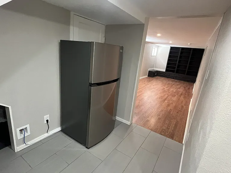 Fridge with icemaker facing living room