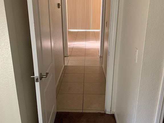 Hall way from master bedroom towards living room