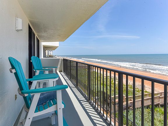 Chairs and table on balcony