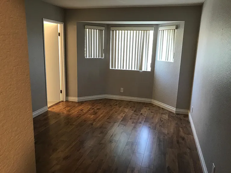 2nd Master Bedroom with Wooden Floor, 3 windows that have View of Pool