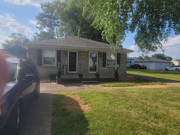 Unit is on right with its own driveway
