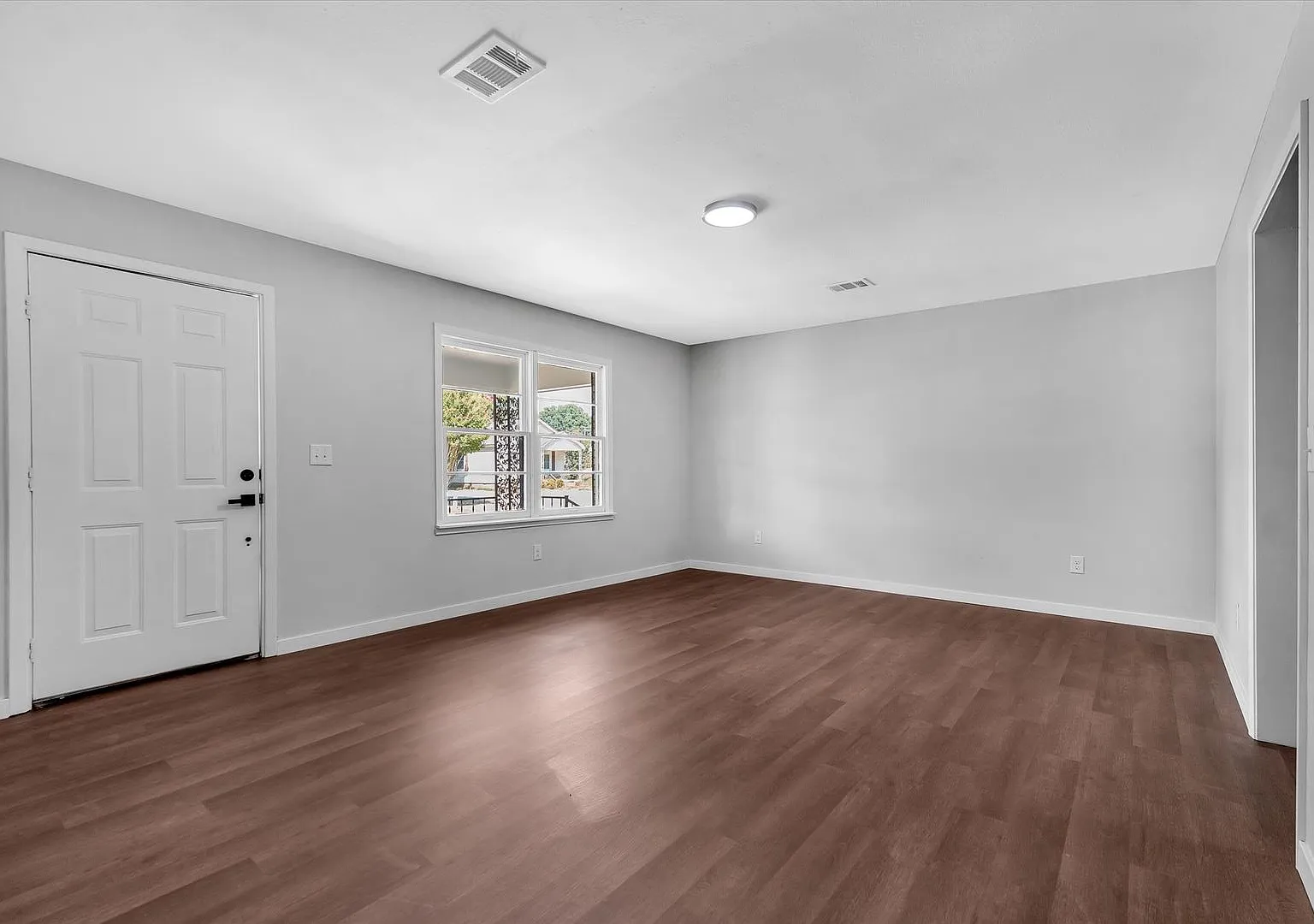 Completely Renovated 3 Bed / 1.5 Bath Home with Dual Living Areas & Patio — Photo 4