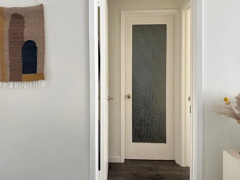 Door to bathroom