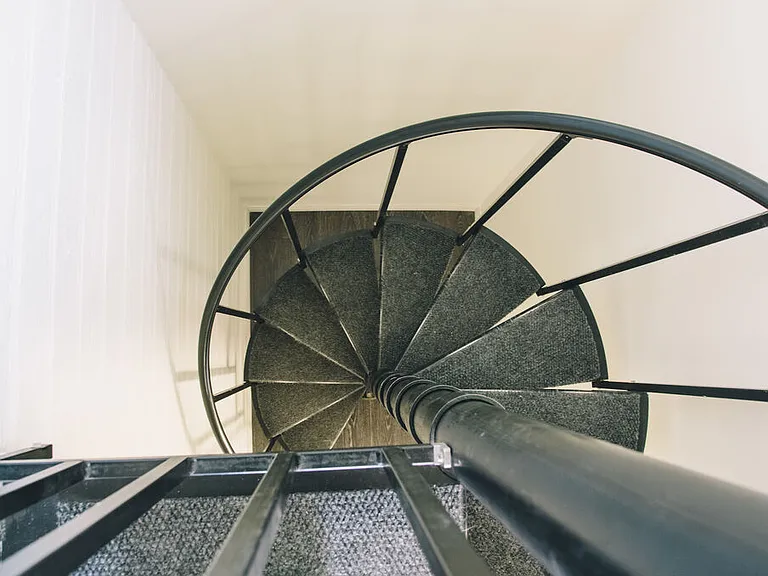 Spiral Staircase to Primary Suite