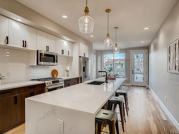 Kitchen with modern fixtures and appliances