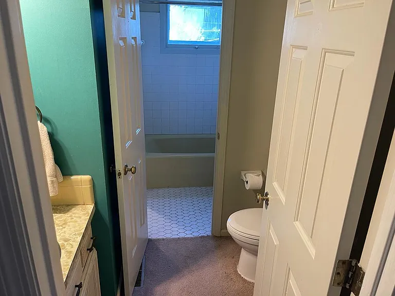 Bathroom off hallway.