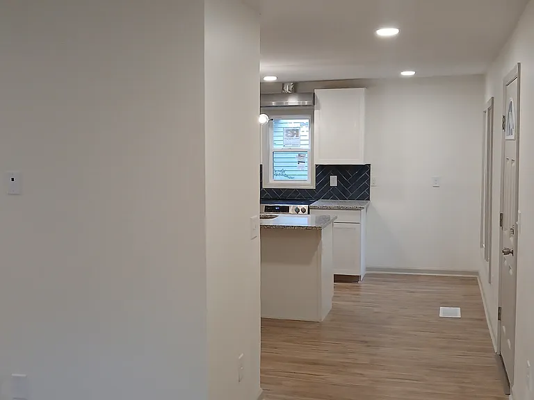 Living room looking towards kitchen