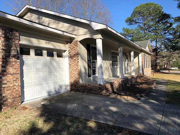 View of garage and front