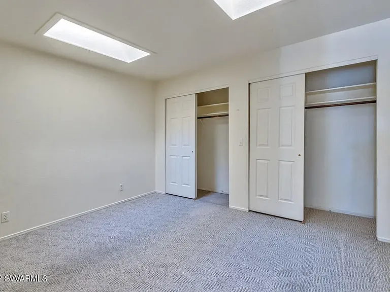 2nd bedroom with skylights