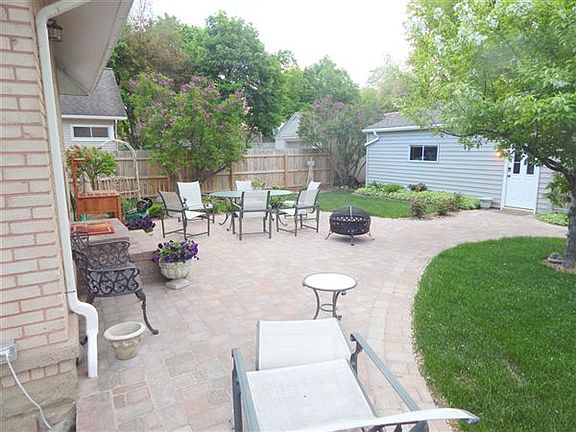 Quiet private back yard with new paver patio, rear entrance