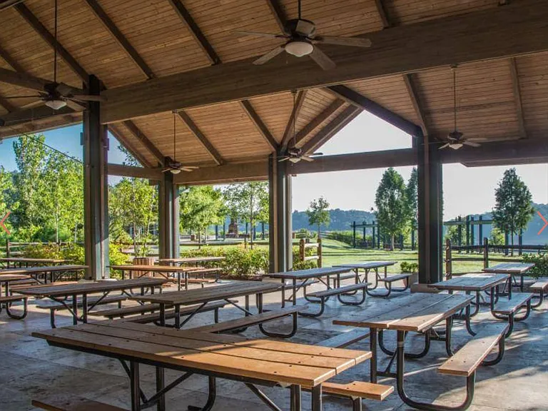 Morgan Falls Park Pavillion great for birthday parties, group meetings with grills for barbeque facing the greenfield and the playground.