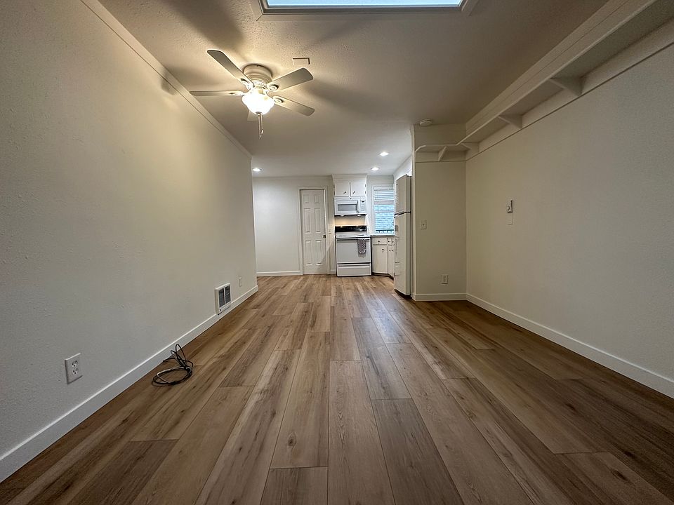 Living space leading into the kitchen/dining area