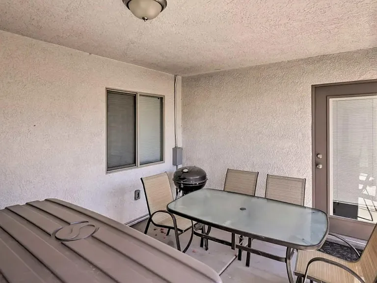 Furnished patio with hot tub