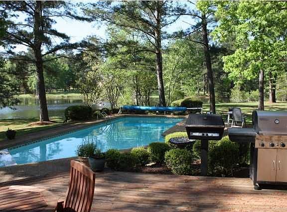 inground pool and deck