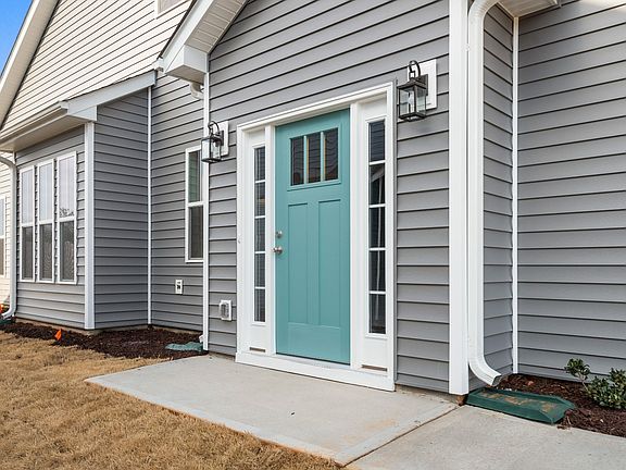 Side Door Front Entry of The Lakehurst Design by DRB Homes