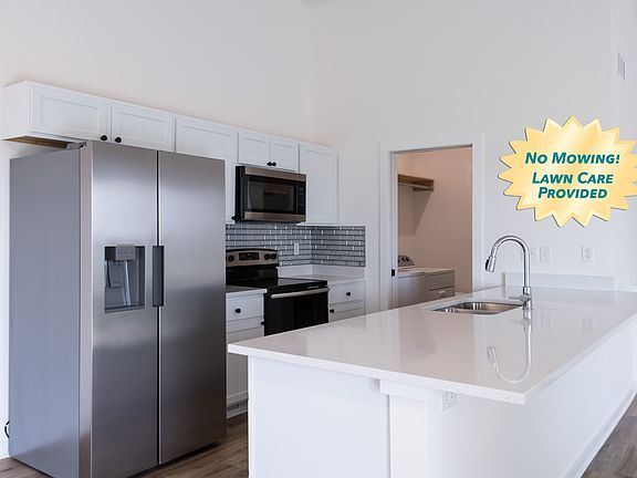 Kitchen, Laundry is in between garage and kitchen