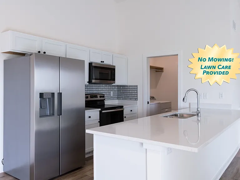 Kitchen, Laundry is in between garage and kitchen