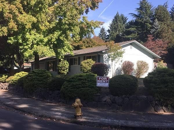 House is on larger corner lot