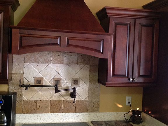 Pot filler over range