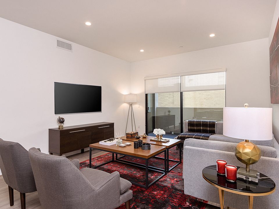 Living Room with Recessed Lighting, Vinyl Flooring, and Patio