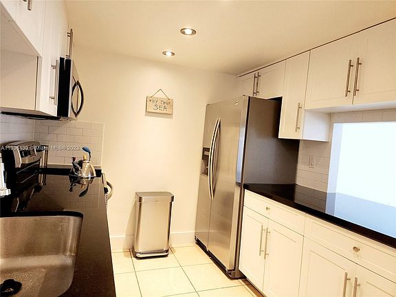 2nd image of 350 Grapetree Dr APT 411